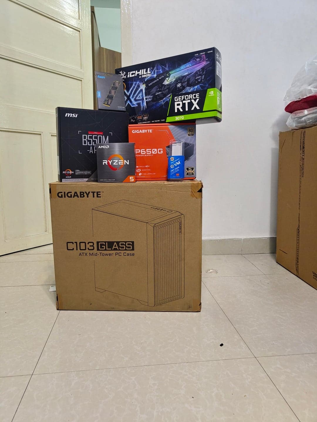 PC case and selected components arranged before assembly